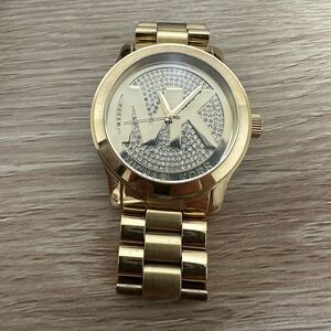 Gold Michael Kors watch with rhinestones